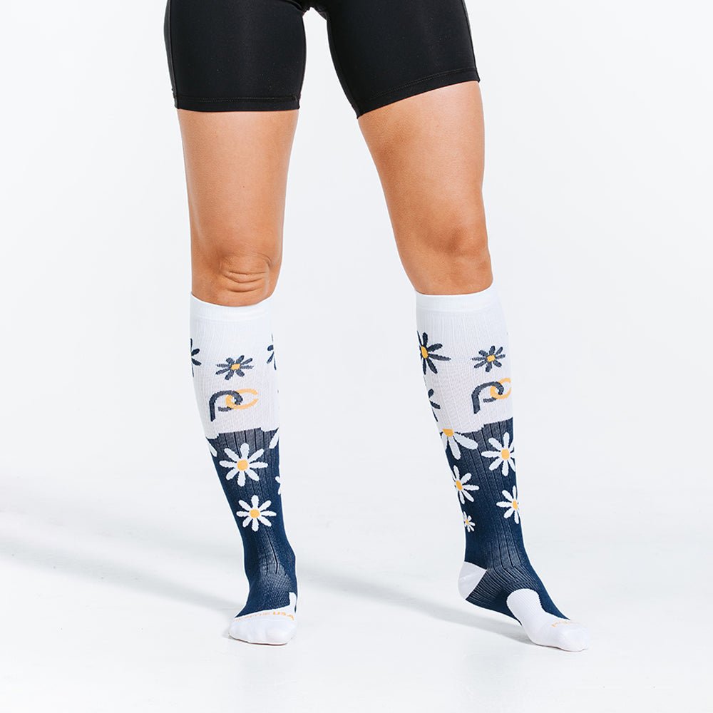 knee high socks with blue and white daisies