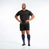 Man wearing PRO Compression Major League Baseball Knee High Compression Sock Genuine MLB Merchandise Sock Atlanta Braves