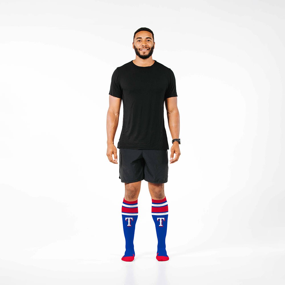 Man wearing PRO Compression Major League Baseball Knee High Compression Sock Genuine MLB Merchandise Sock Texas Rangers