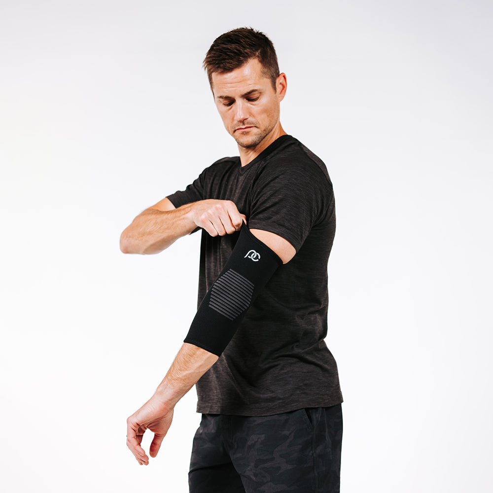 Man wearing PRO Compression Elbow Sleeve
