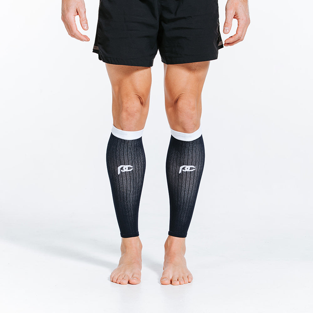 https://procompression.com/cdn/shop/products/03102022_Graduated_Compression_Calf_Sleeves_Navy_Over_White_3_2048x.jpg?v=1646975561