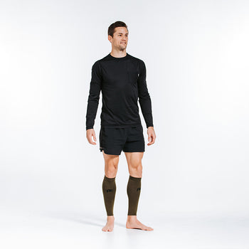 compression calf sleeves in olive green stealth color - on model