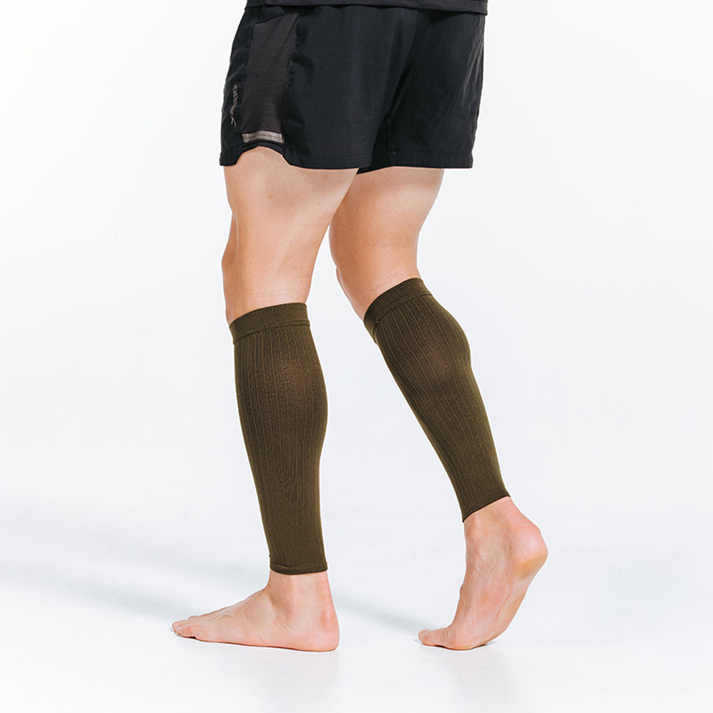 compression calf sleeves in olive green stealth color - anterior view