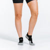 PRO Compression Trainer Low Tab socks in black | Ankle Compression Socks | woman wearing socks close up