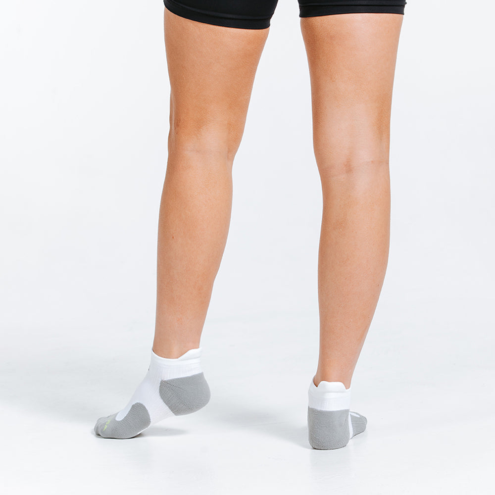 White Low Compression Socks - Ankle Socks - on model close up on heel tabs