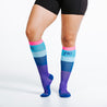 Knee high compression socks - gradient purple, blues, and pink colors on foot model