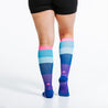 Knee high compression socks - gradient purple, blues, and pink colors - anterior view