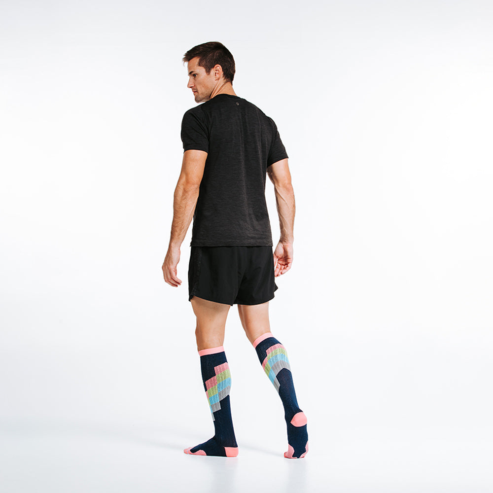 Marathon knee high compression socks in pastel chevron design motif - model angle 1