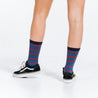 Crew length compression socks in red and blue - close up on back of socks 