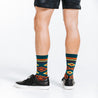 Compression crew socks with green Aztec design - back and side view on model