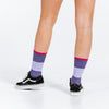 Compression socks in crew length - purple color block with pink bands - close up on back of socks