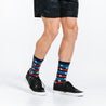 Compression crew socks with patriotic red, white, and blue design with stars - close up on feet