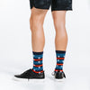 Compression crew socks with patriotic red, white, and blue design with stars - close up on feet rear view