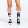 Blue, pink, and white striped crew length compression socks - close up