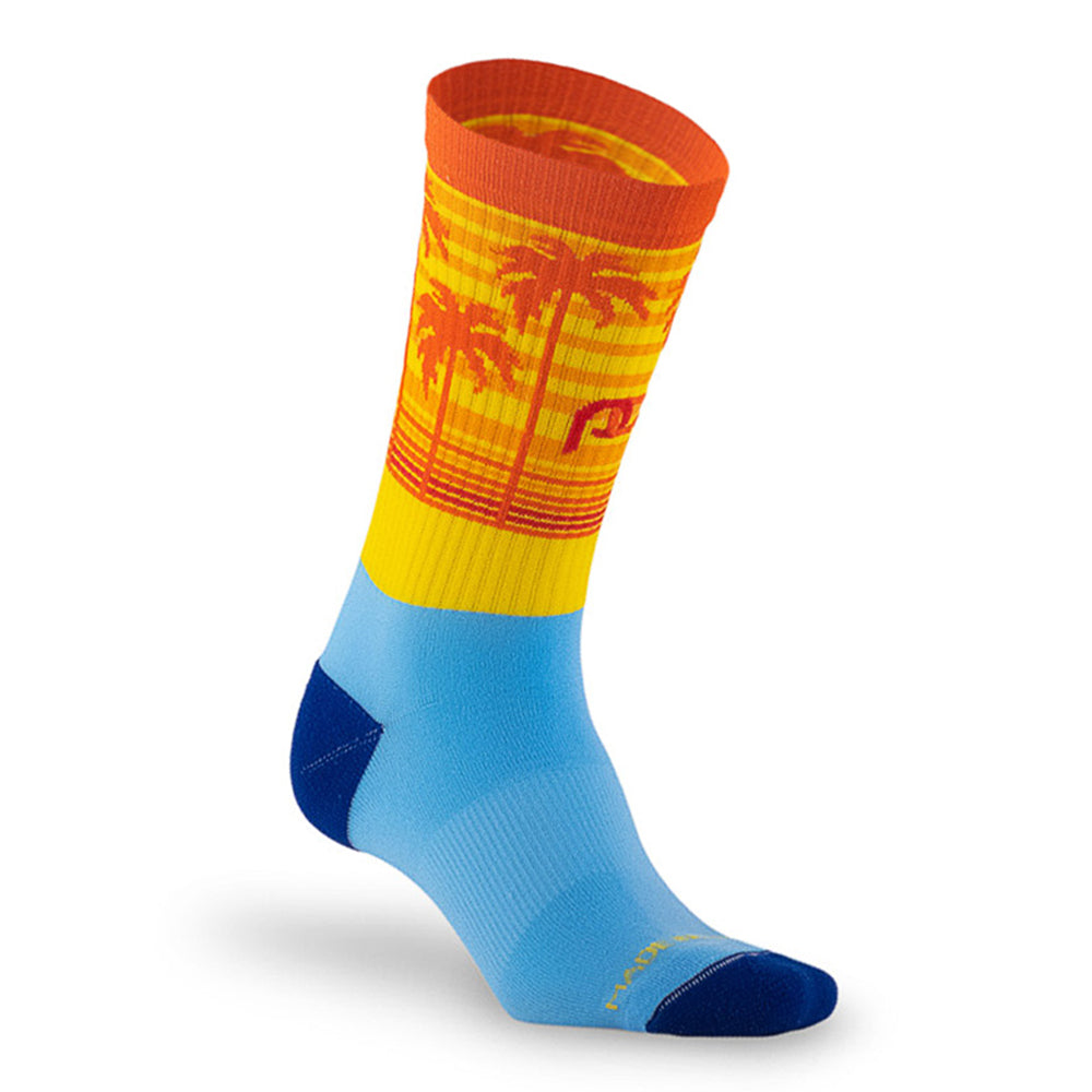 Crew length compression sock blue and orange with sunset and palm trees