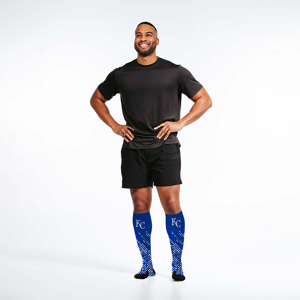 Man wearing PRO Compression Major League Baseball Knee High Compression Sock Genuine MLB Merchandise Sock Kansas City Royals