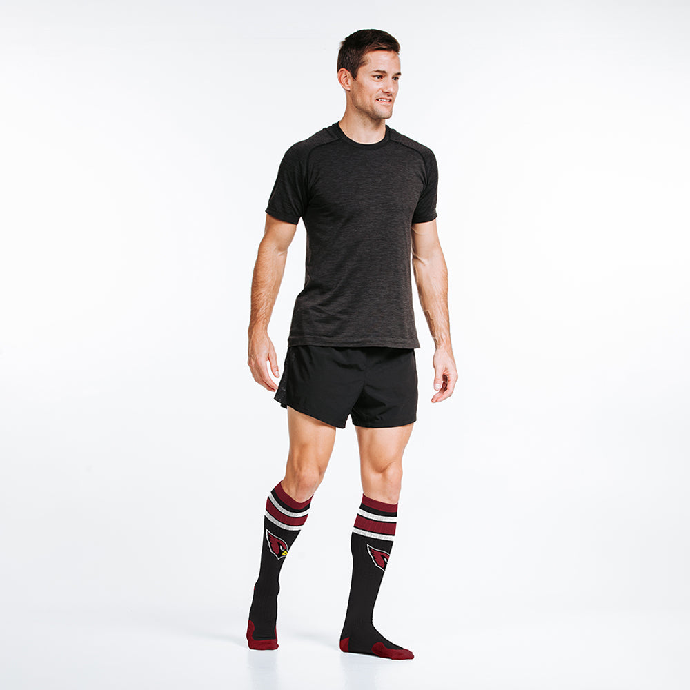 Male model wearing Arizona Cardinals officially-licensed NFL Knee-high Compression Socks