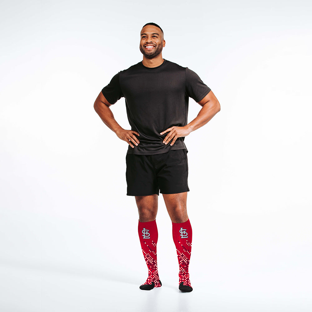 Man wearing PRO Compression Major League Baseball Knee High Compression Sock Genuine MLB Merchandise Sock St. Louis Cardinals
