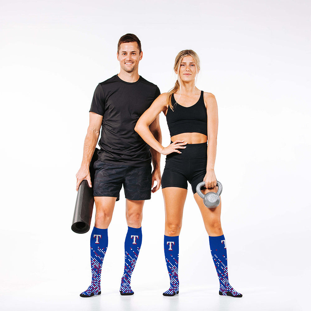 Man and woman wearing PRO Compression Major League Baseball Knee High Compression Sock Genuine MLB Merchandise Sock Texas Rangers